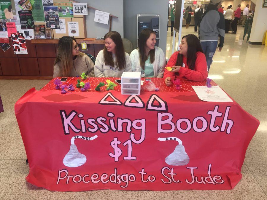 Tri Deltas working the Kissing Both on Valentines Day