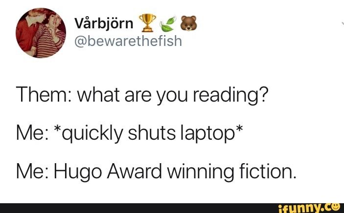 Twitter user @bewarethefish jokes that they are reading “Hugo winning fiction” in reference to AO3 winning a Hugo Award.